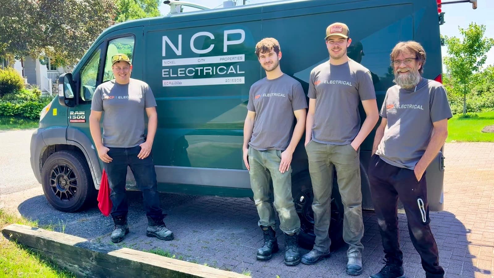 The NCP Electrical crew — owner Mike Fulcher and the team — by the company van in Greater Sudbury